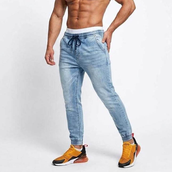 Calça Jogger Masculina Jeans e Sarja Rasgada e lisa Com Punho e Cordão de ajuste