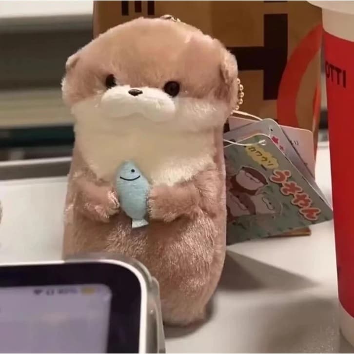Chaveiro Pelúcia Lontra Sino Peixinho Fofo para Bolsa Mochila Presente Criativo