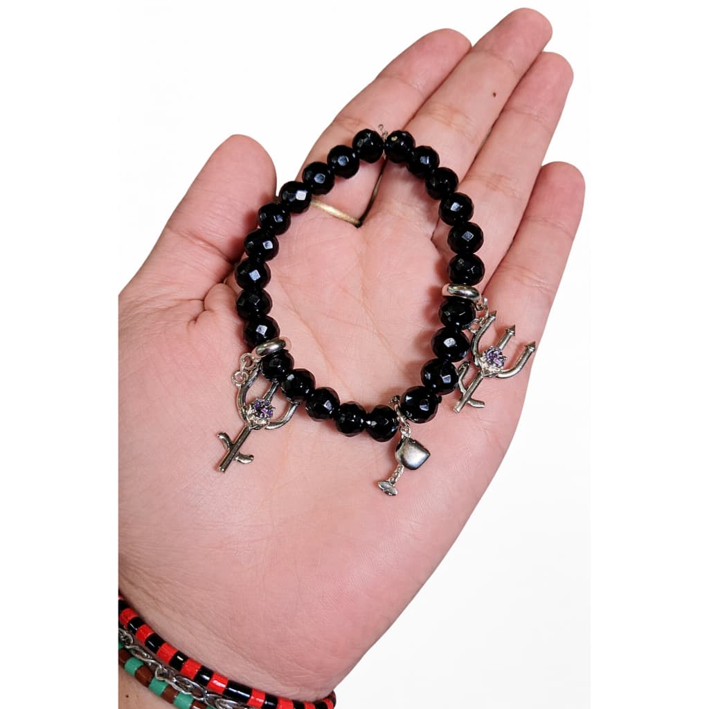 Pulseira de Proteção Pombogira cristal 8mm com 3 pingentes Tridente - Rosas Roxas Preta  Mulambo Entidade Pombogira