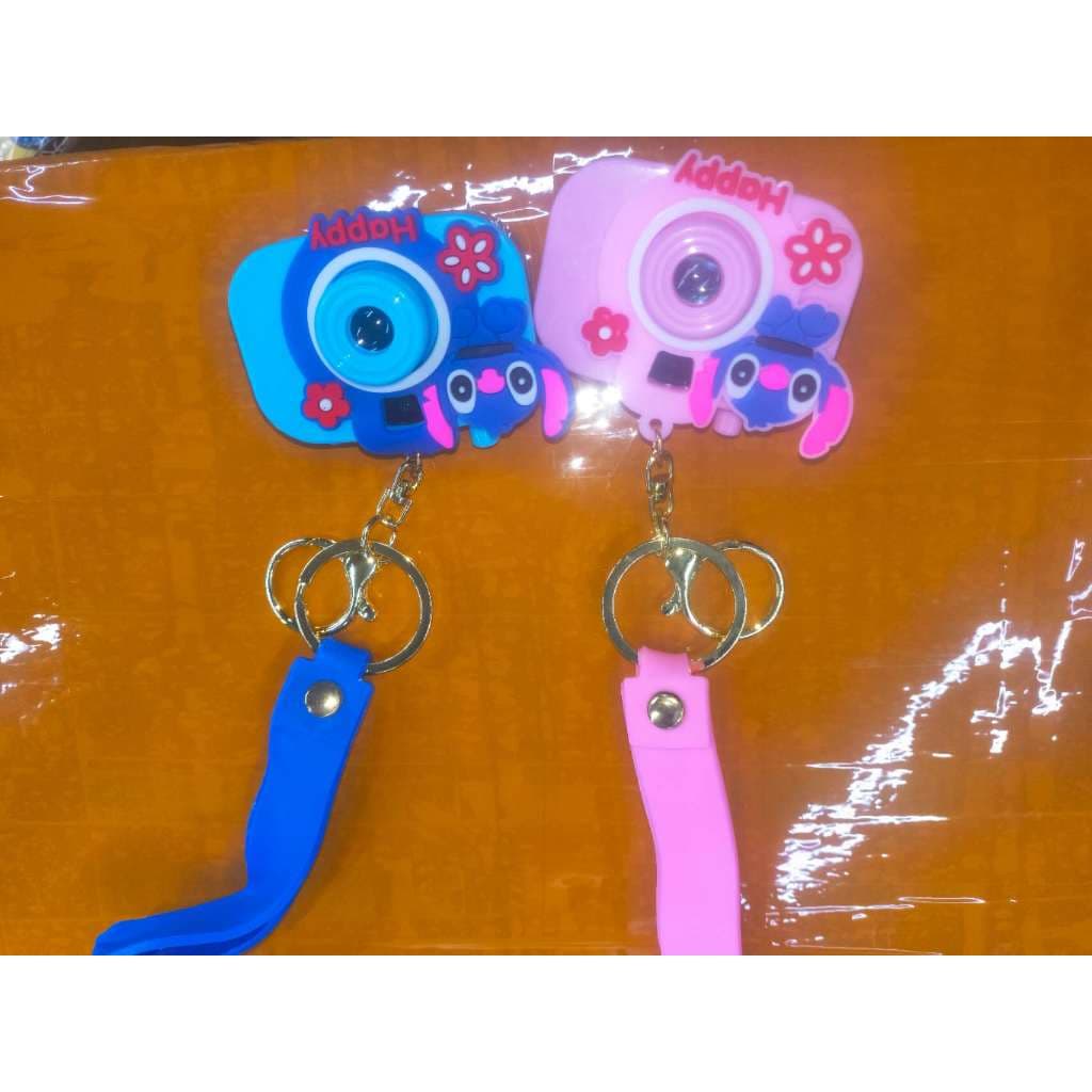 Chaveiro Stitch Mini Câmera Surpresa com Projeção Colecionável