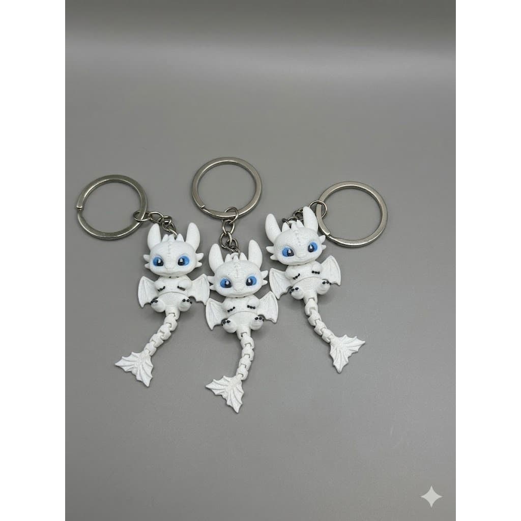 Kit Chaveiro Fúria da Luz Branca Articulado Como Treinar Seu Dragão Geek Presente Colecionável