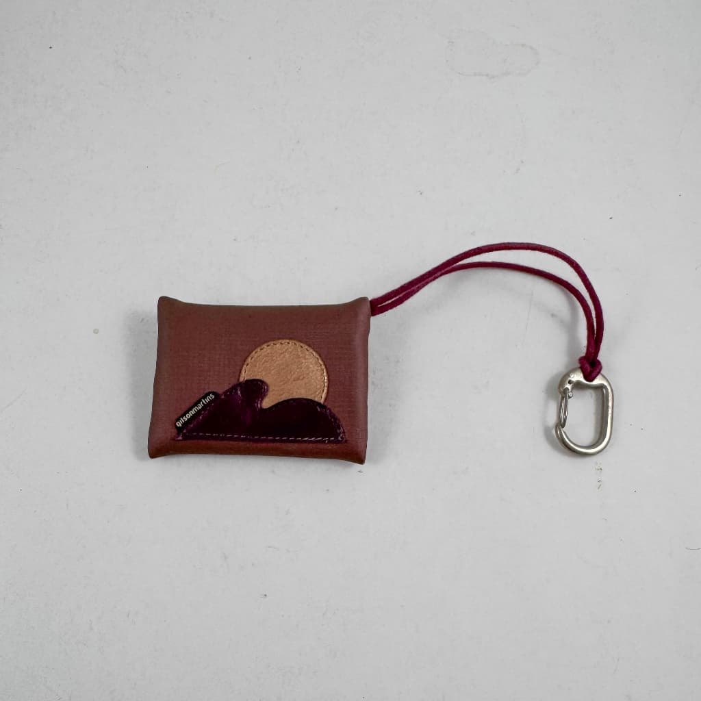 Porta moedas moedeiro de courino em tons de marrom marca Gilson Martins