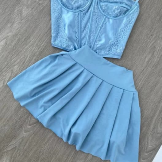 Saia plissada e Feminino Moda Gringa Tendência verão europeu 2026 estilo short Saia