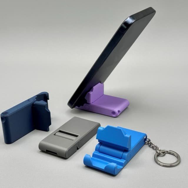Suporte de Celular Portátil Dobrável com Chaveiro | Base Ajustável Compacta para Mesa e Viagem
