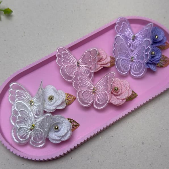 Par de borboleta rosa para festa jardim encantado, presilha infantil no bico acessório.