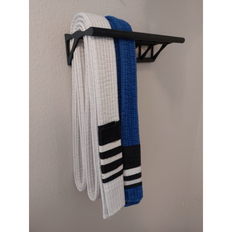 expositor/ suporte de faixa de jiu jitsu  parede