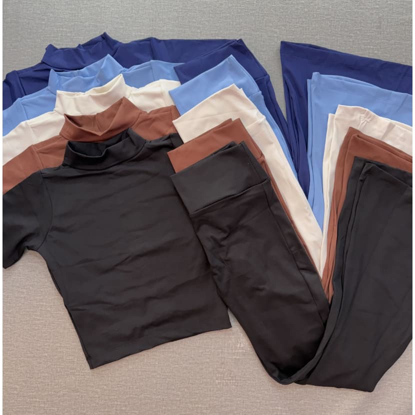 Conjunto blusa golinha com manga e calça flare empina bumbum para academia ou uso casual zero transparência