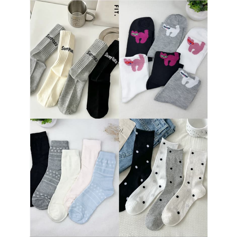 12 pares de meias femininas de cano médio em diversos estilos, incluindo casuais e esportivas, e tamanhos de 35 a 40.