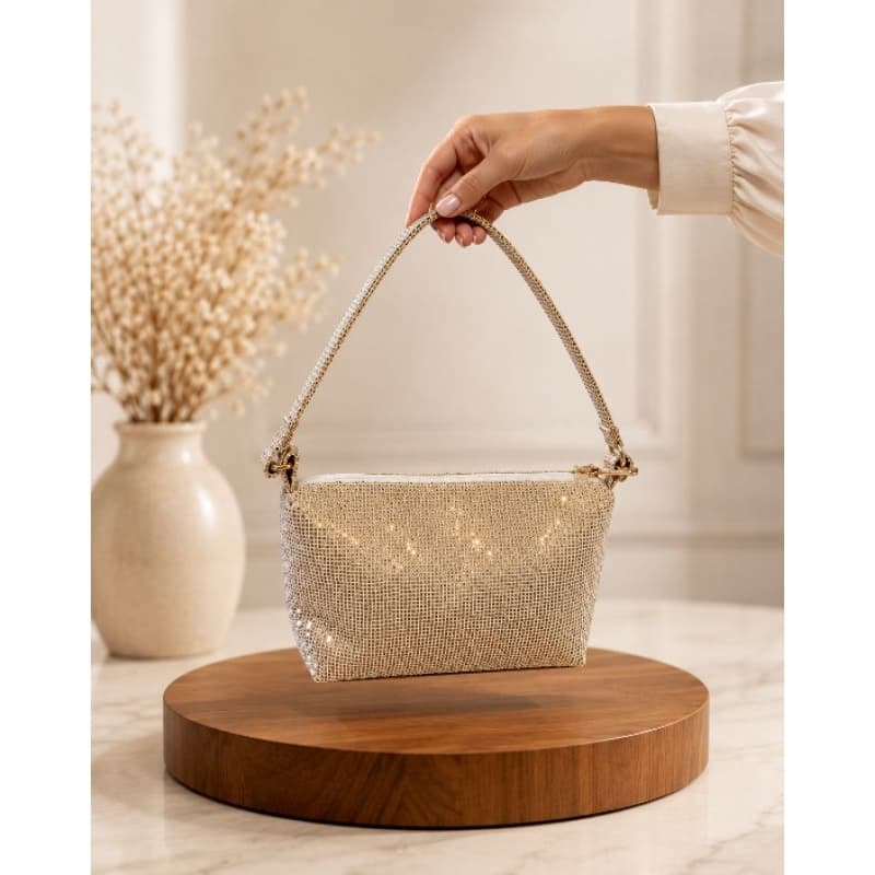 Bolsa de festa glitter dourado.Alça de mão com zíper, espaçosa , sem divisão interna, perfeita para eventos  formais.