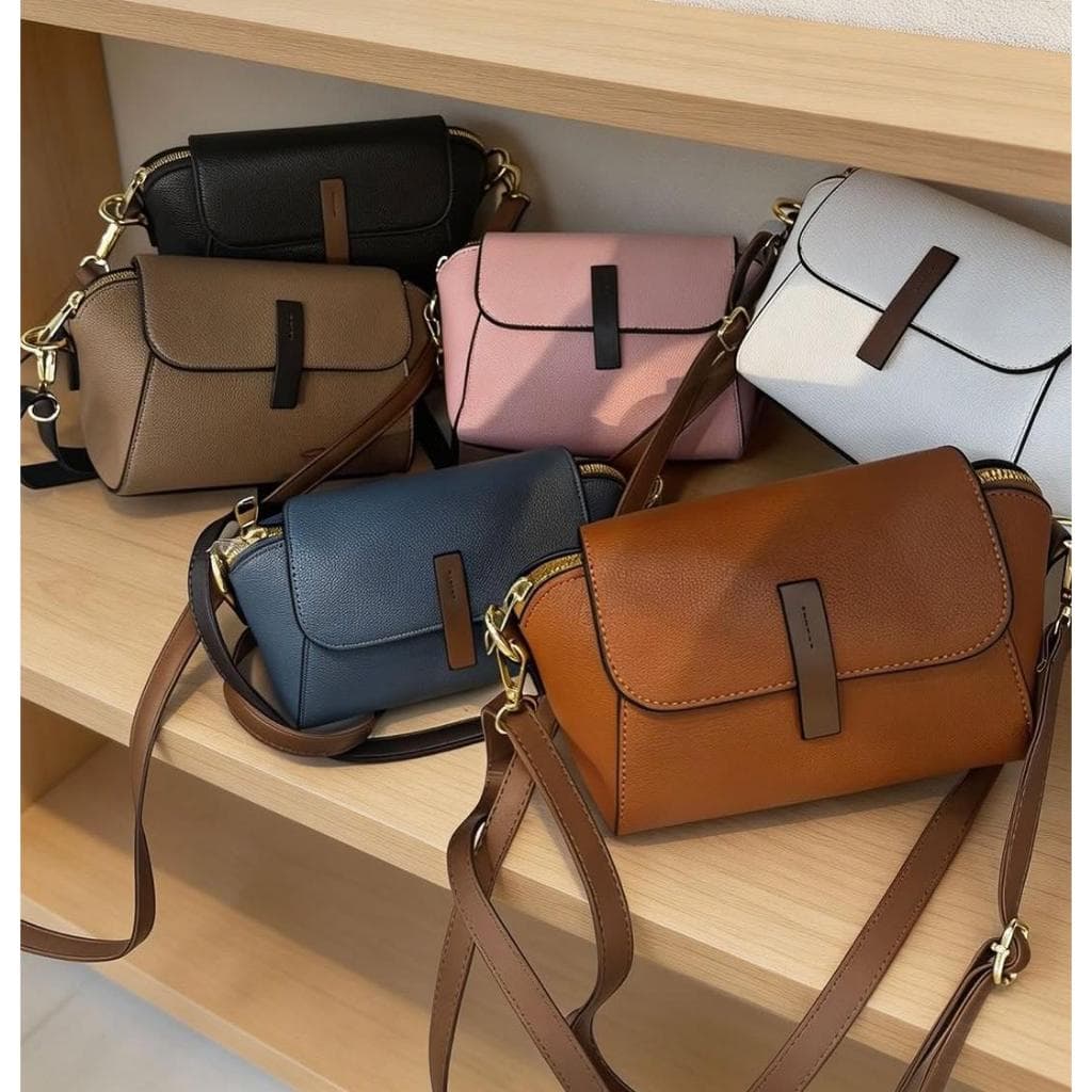 Bolsa feminina tamanho excelente e alça transversal