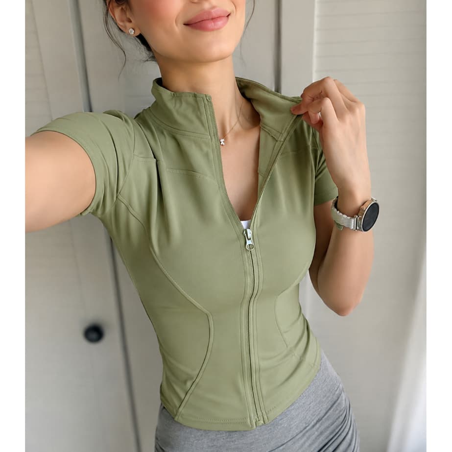 Blusa Casaco Fitness Feminina Modeladora Disfarça Barriga Manga Curta com Zíper Gola Alta Academia Dia a Dia