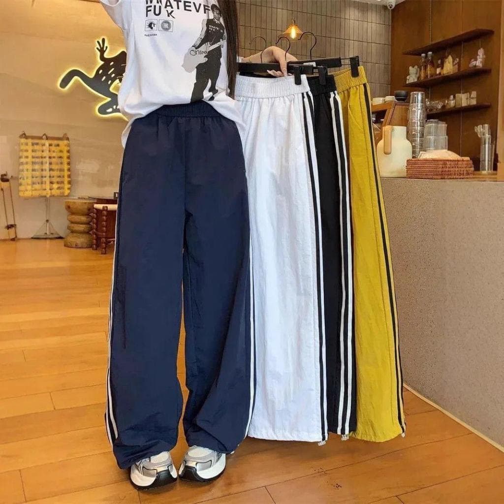 Calça feminina esportiva, cintura alta, perna larga, para treino e dança (listra lateral)