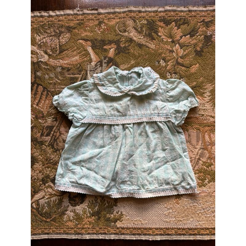blusa de bebê azul