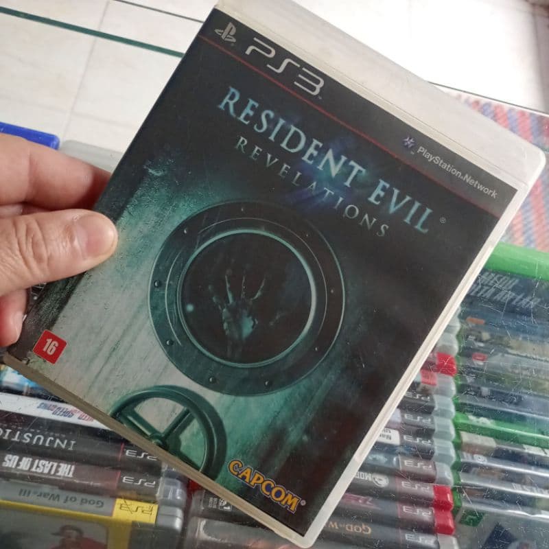JOGO RESIDENT EVIL REVELATIONS PS3 MIDIA FÍSICA SEMI NOVO