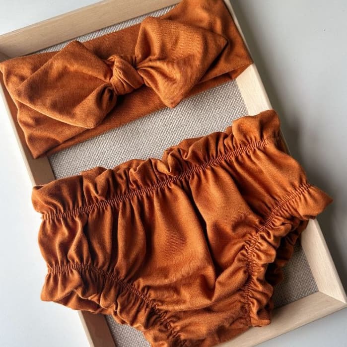 Conjunto calcinha aparadora + laço menina malha 100% algodão tamanho único.