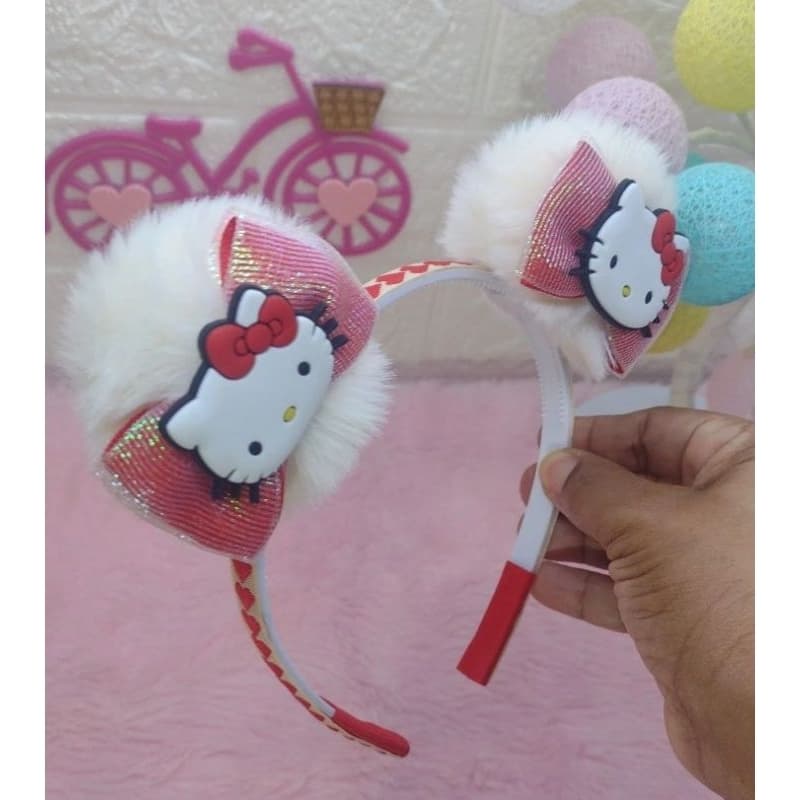 Tiara Hello Kitty pompom lacinhos vermelhos com brilho.