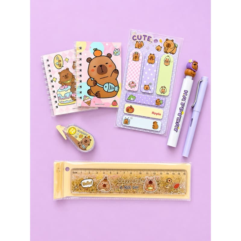 Kit Papelaria Capivara Kawaii 7 Itens – Mini Cadernos, Lápis Infinito, Régua Glitter e Sticky Note