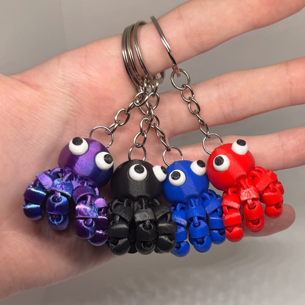 Chaveiro de Polvo Flexível 3D Tentáculos Articulados
