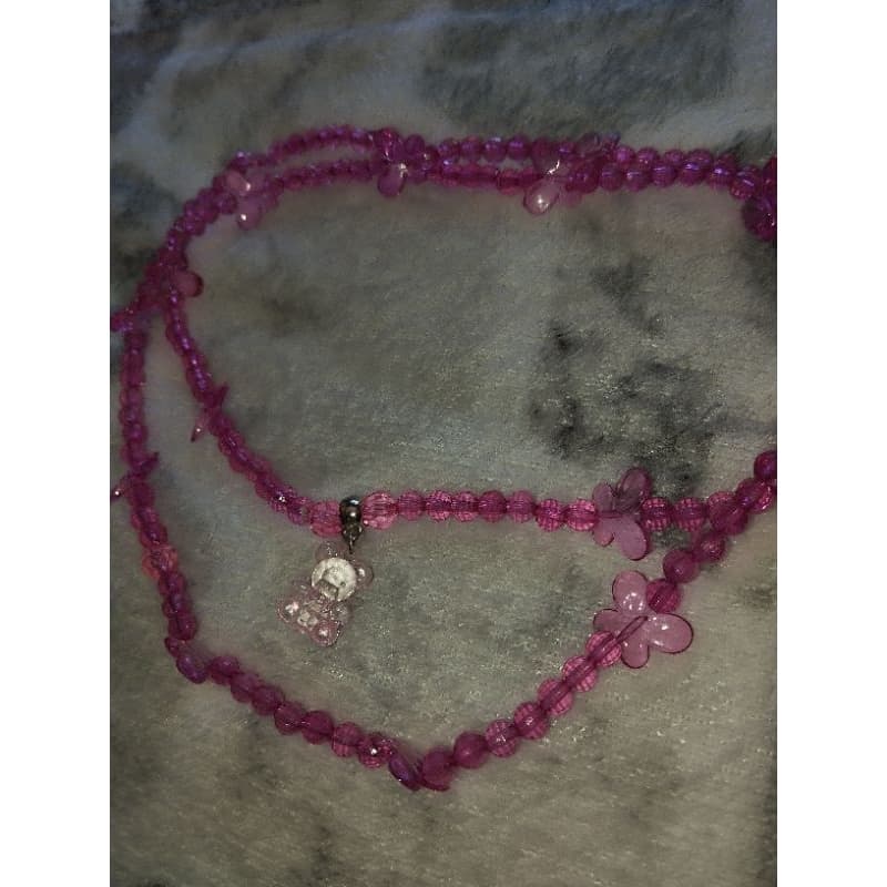 guia de erê com borboletas rosa, micangas rosa, umbanda candomblé,  borboletinha,  mariazinha, rosinha