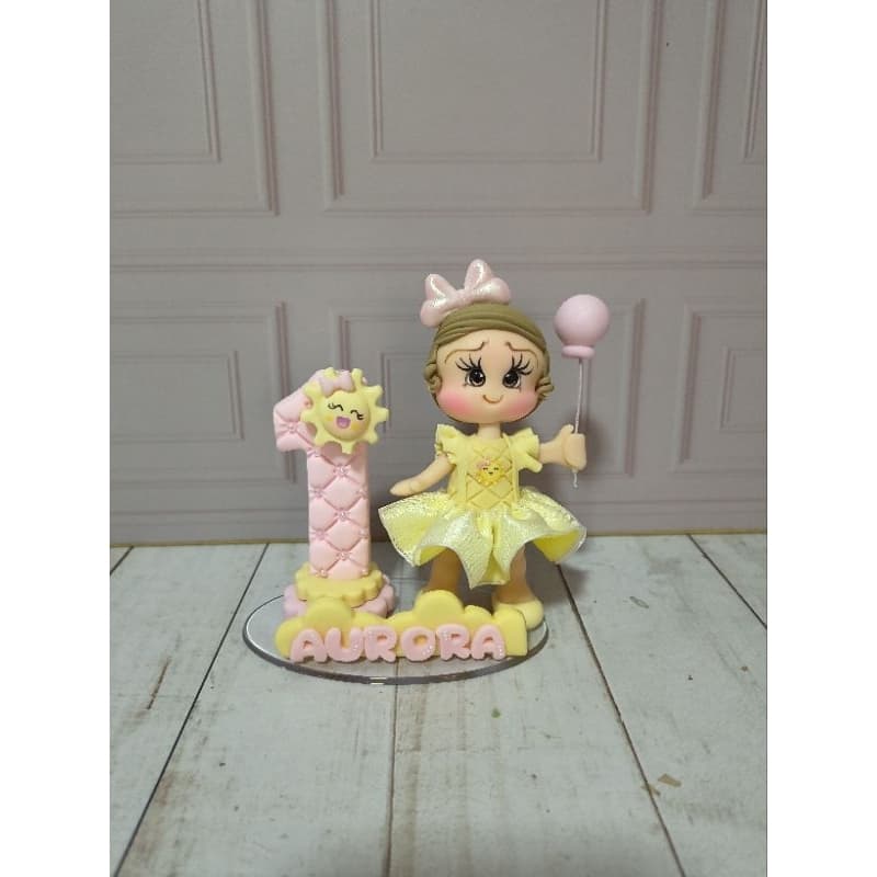Vela em biscuit 365 Volta ao Sol menina