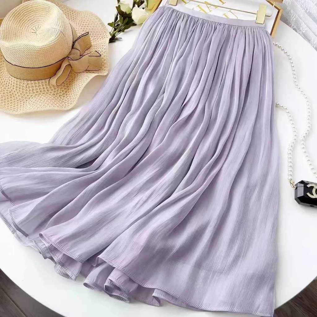Saia longa feminina plissada elegante, cintura alta modelo evasê fluido, várias cores disponíveis.