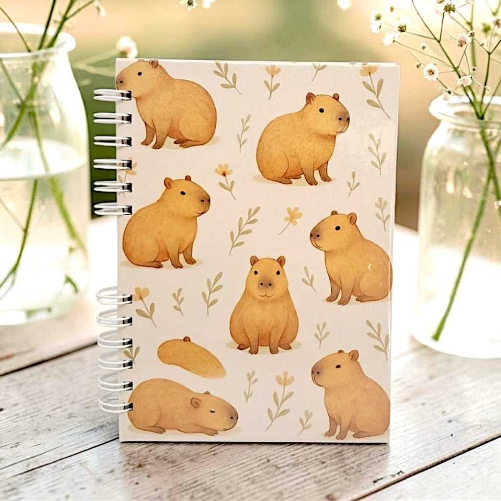 CADERNO SEM PAUTA DE ANOTAÇÕES NOTE A5 WIRE-O 5/8 CAPA DURA CAPIVARA