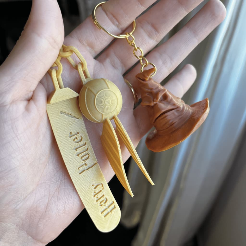 Kit 10x Chaveiro Chapéu Seletor + Marca Página Pomo Ouro