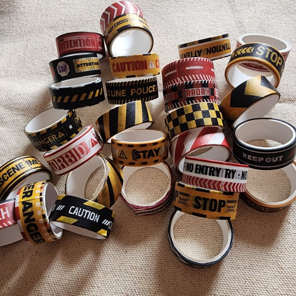 Uma Washi Tape de faixa, crime scene, under construction, stop, do not cross e outras