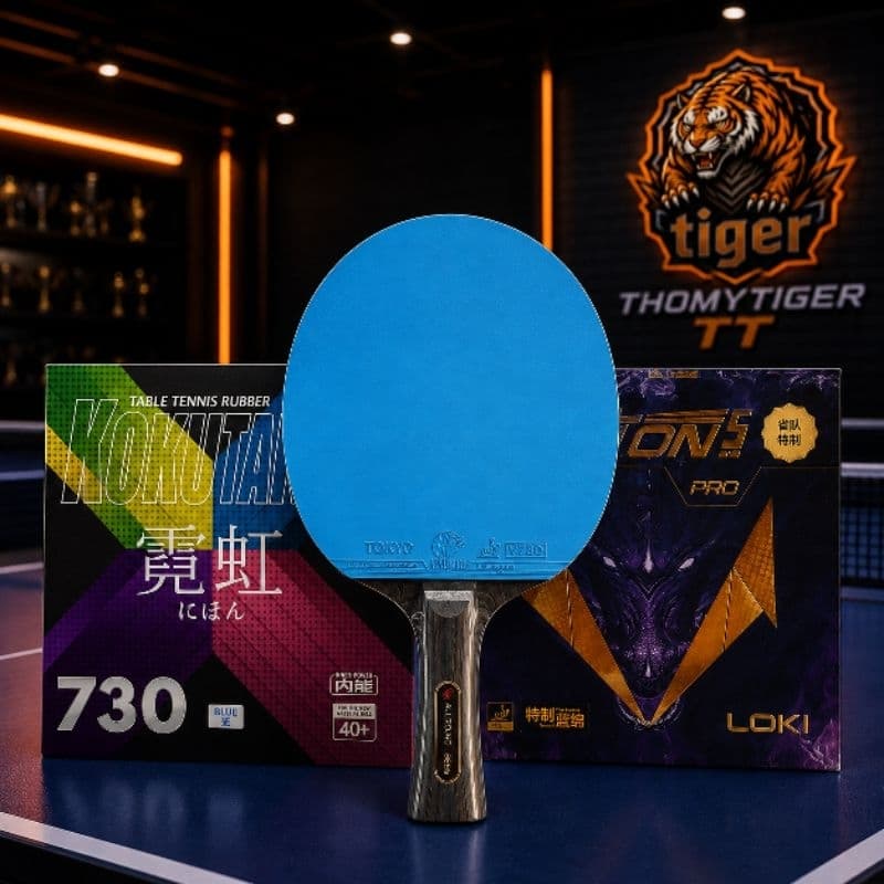 Raquete de tênis de mesa Boer Lion com borrachas Kokutaku 730 azul e RXTON 5 PRO preta.