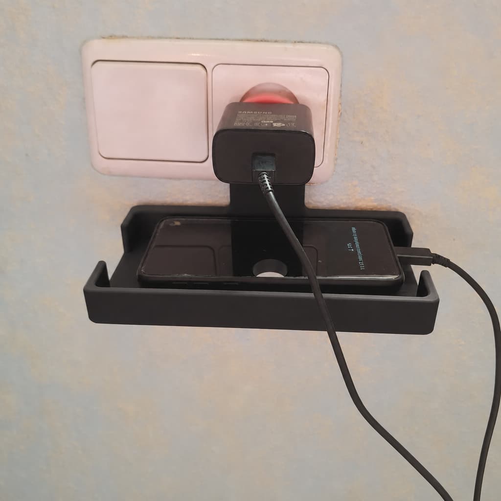 Suporte Para Celular Na Tomada Carregador Apoio Parede Acessório iPhone Samsung Android Preto