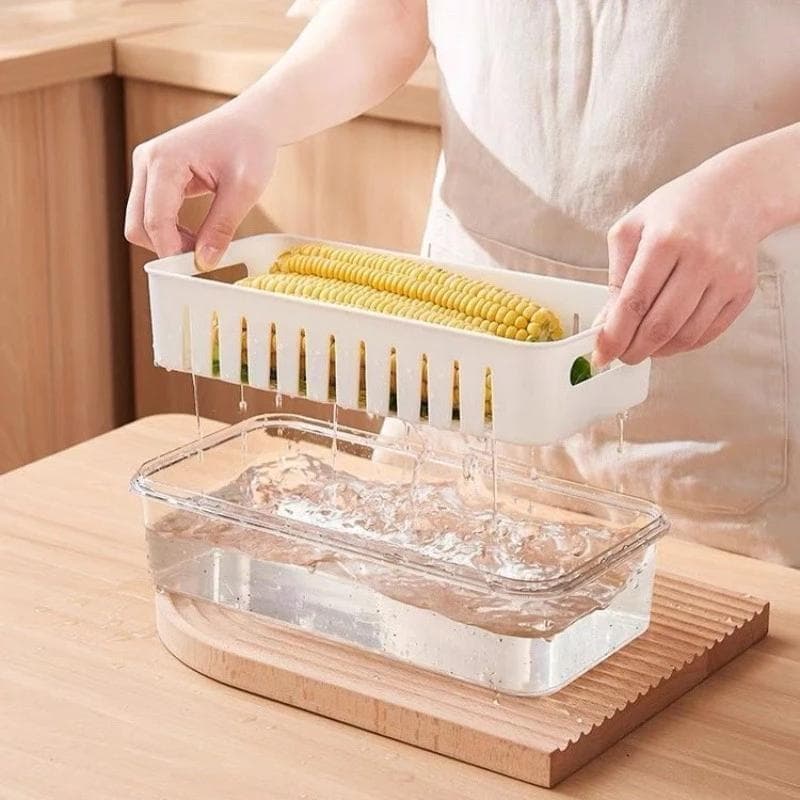 Caixa hermética para armazenamento de alimentos em geladeira, com camada de drenagem, ideal para guardar frutas.