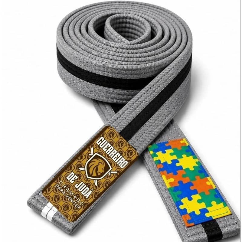 Faixa de jiu-jitsu com viés preto e tarja autismo