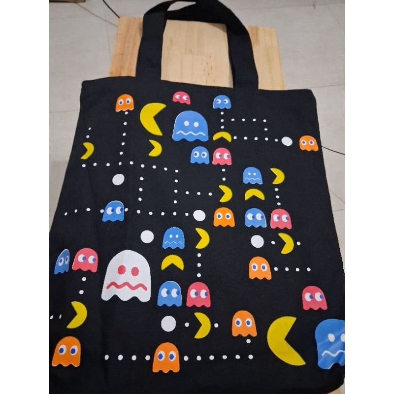 BOLSA EM SARJA PAC-MAN COM FORRO, ZÍPER E BOLSO INTERNO - TOTE BAG GAMES ATARI GEEK RETRÔ VINTAGE