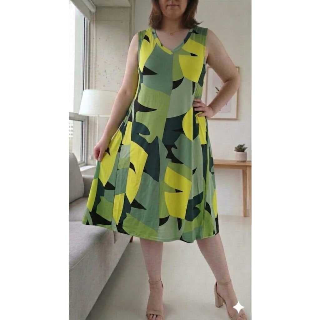 Vestido Confortável Soltinho Sem Mangas com Bolsos Laterais Embutidos em Malha Fria Liganete
