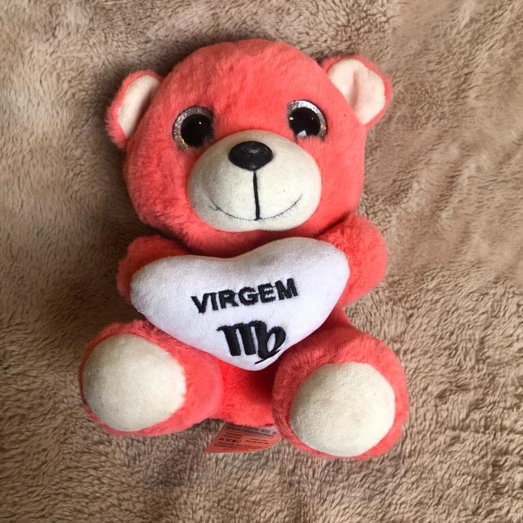 Urso de pelúcia rosa de Virgem
