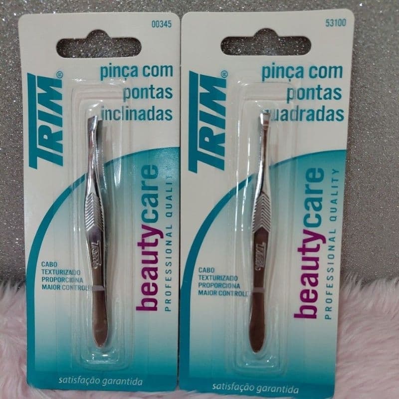 kit com 2 pinças para sobrancelha da trim contendo 1 com ponta inclinada e 1 com ponta quadrada