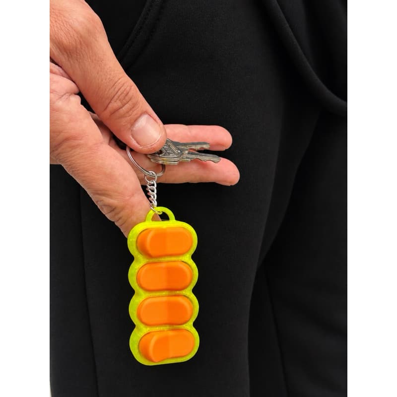 Chaveiro com Brinquedo Sensorial Fidget Toy Interruptor Clique Relaxante - Anti Estresse e Ansiedade + Brinde