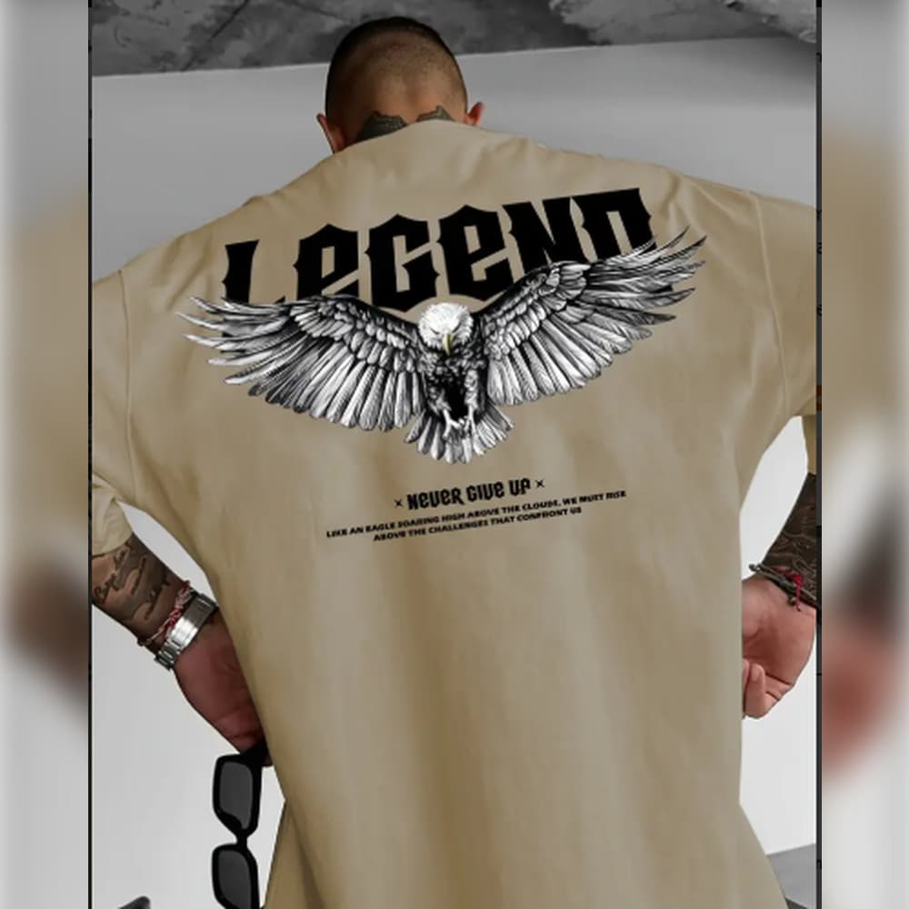 Camiseta Masculina de Streetwear com Estampa Gráfica - "Nunca Desista" Com Design de Asa e Caveira, Ajuste Solto Casual