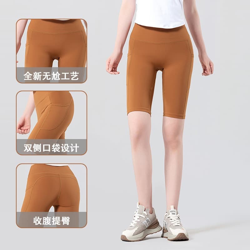 Calças cortadas de ioga femininas sem linhas embaraçosas nuas Leggings esportivas bolsos laterais ciclismo Fitness corri