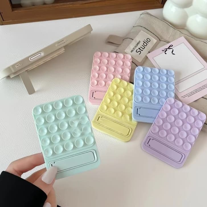Doce Cor Macio Silicone Adesivo Ventosa Suporte De Mesa Do Telefone Volta Anexado Espelho Banheiro Anti Deslizamento