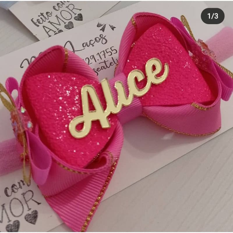 Laços na faixinha ou no bico de pato,com nome personalizados