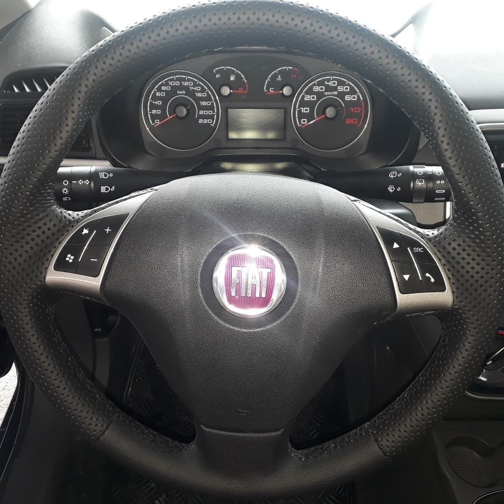 capa de volante costurada punto com controle