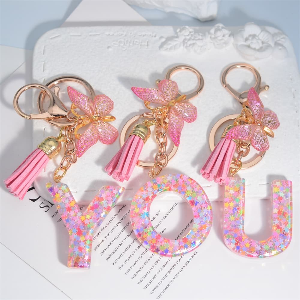 Nova Resina Rosa A-Z Cartas Iniciais Porta-Chaves Tassel Butterfly Pendant Para Meninas Bolsas Femininas Carros Acessórios