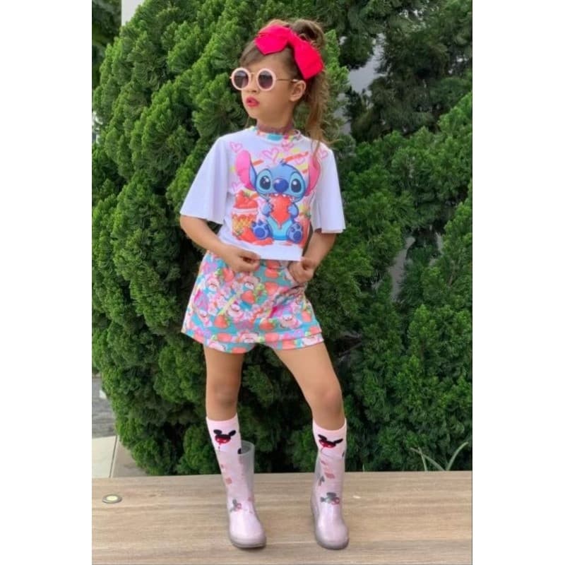 Conjunto de Menina verão  tendência stich 4 6 conjunto infantil bloguerinha blusa e short saia.