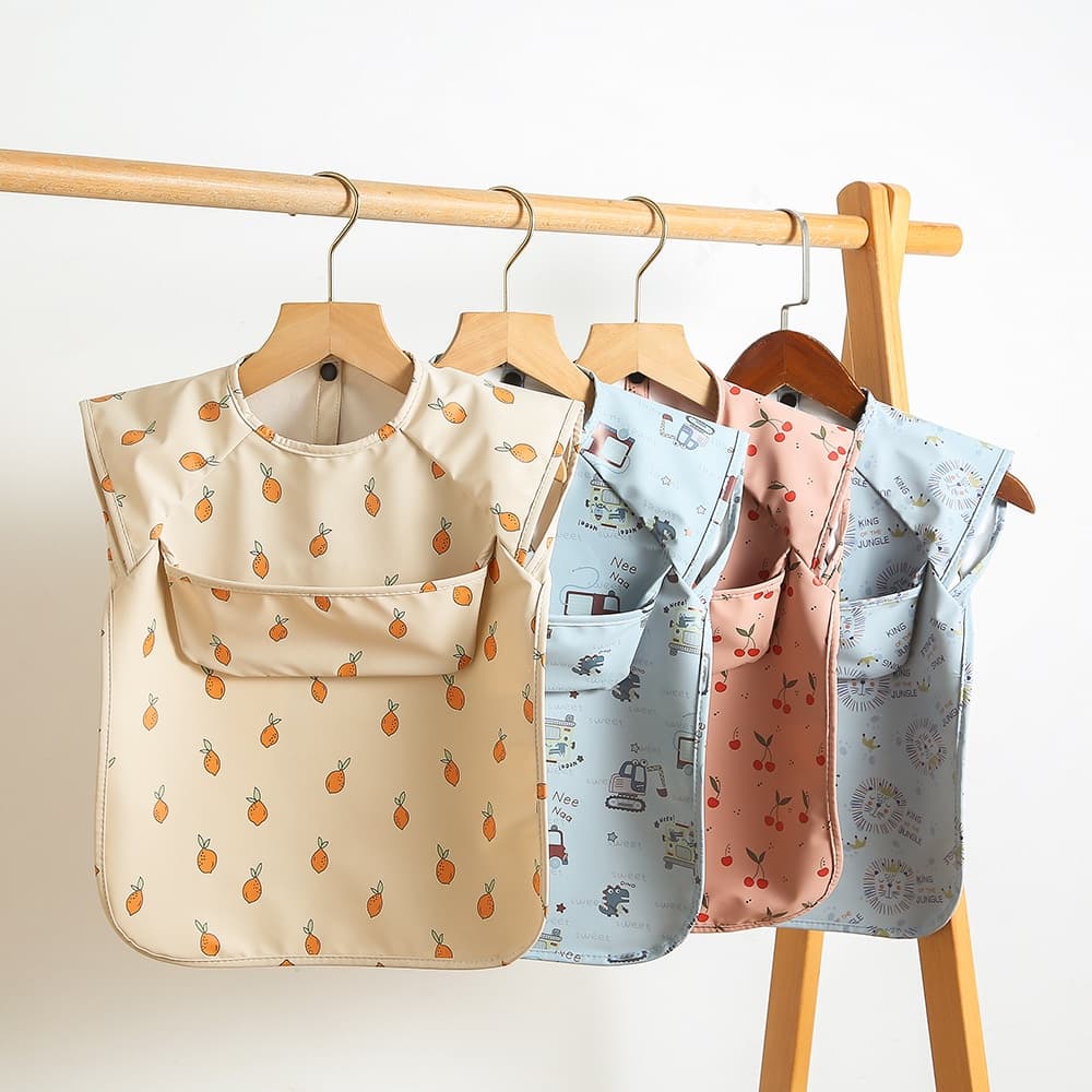 Babador Infantil Sem Mangas Com Bolso Superior Em PU À Prova D'água , Blusa De Poliéster , Tafetá , Roupas De Jantar Par