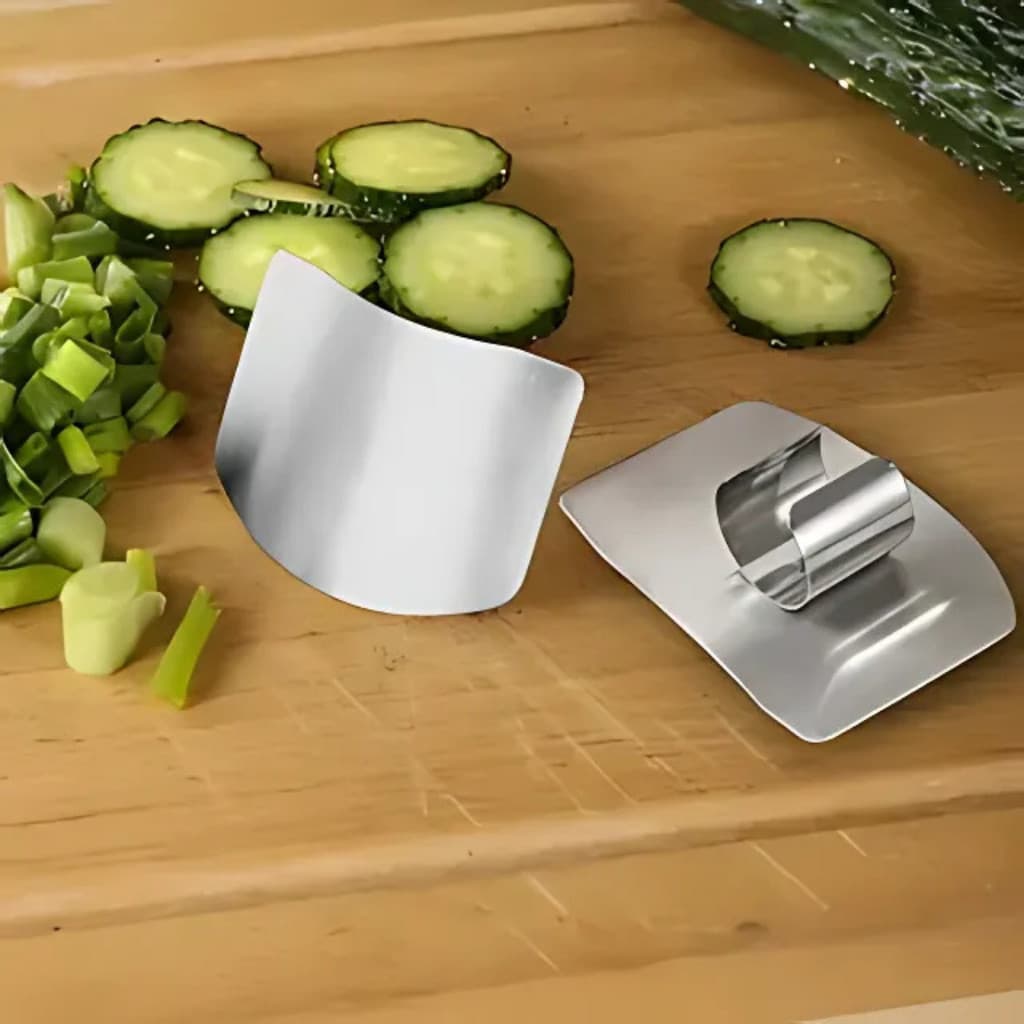 Protetor para dedos contra cortes em Aço Inox com um Anel para cortar carnes. legumes e verduras