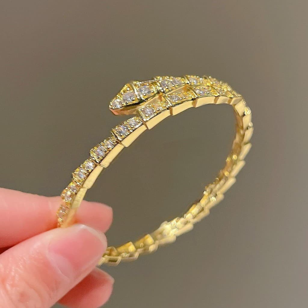 Novo Estilo De Pulseira De Ossos De Cobra Européia E Americana Com Diamante Completo Mola Aberto GNKZ