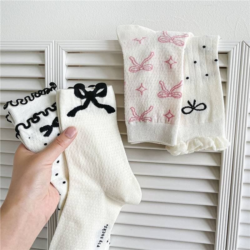 Meias de arco femininas primavera verão meias de tubo médio finas absorventes de suor preto branco All-Match ins meias d
