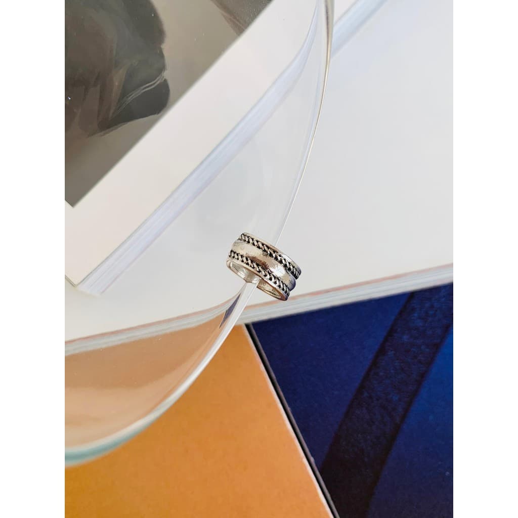 Piercing fake Unissex folheado a prata modelo rustico