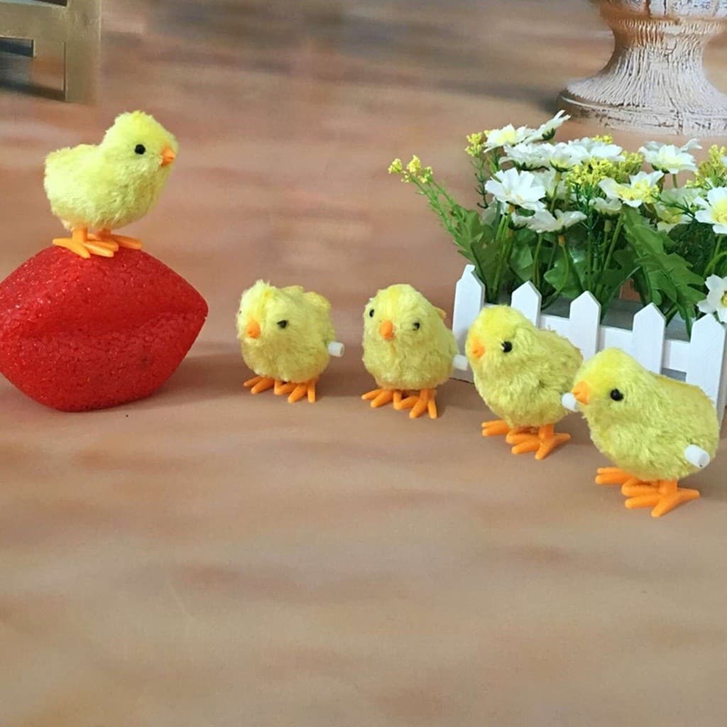 Pintinho Amarelinho de Pelúcia com Corda Brinquedo Infantil que Pula